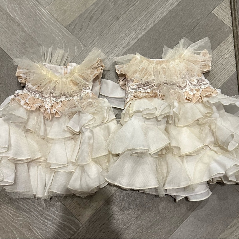 Elegant Ivory Ruffled Baby Dresses